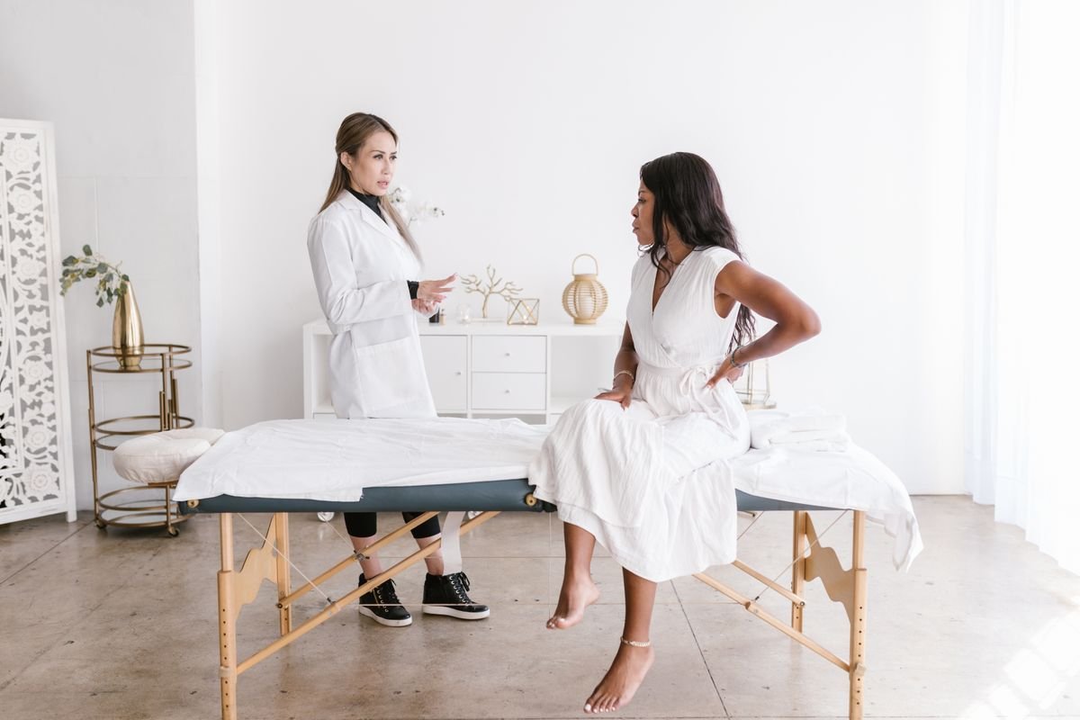 Medical professional consulting with a patient